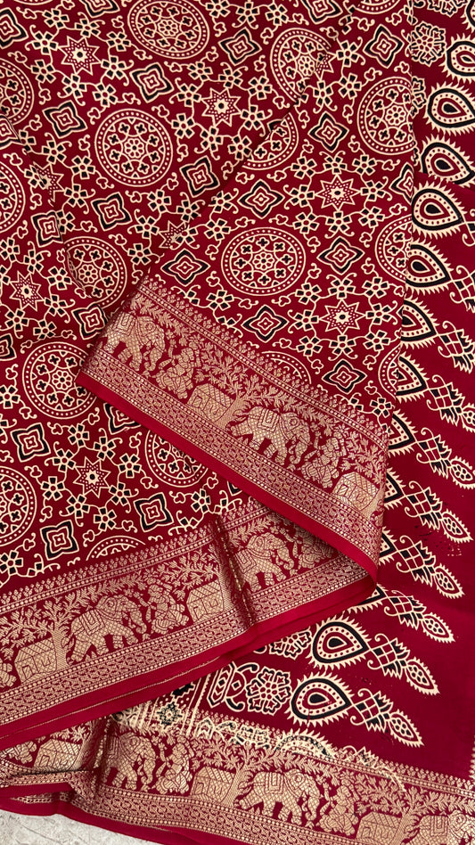 Pure Modal Based Saree with Ajrakh Prints & Banarasi Elephant Zari Border – Maroon