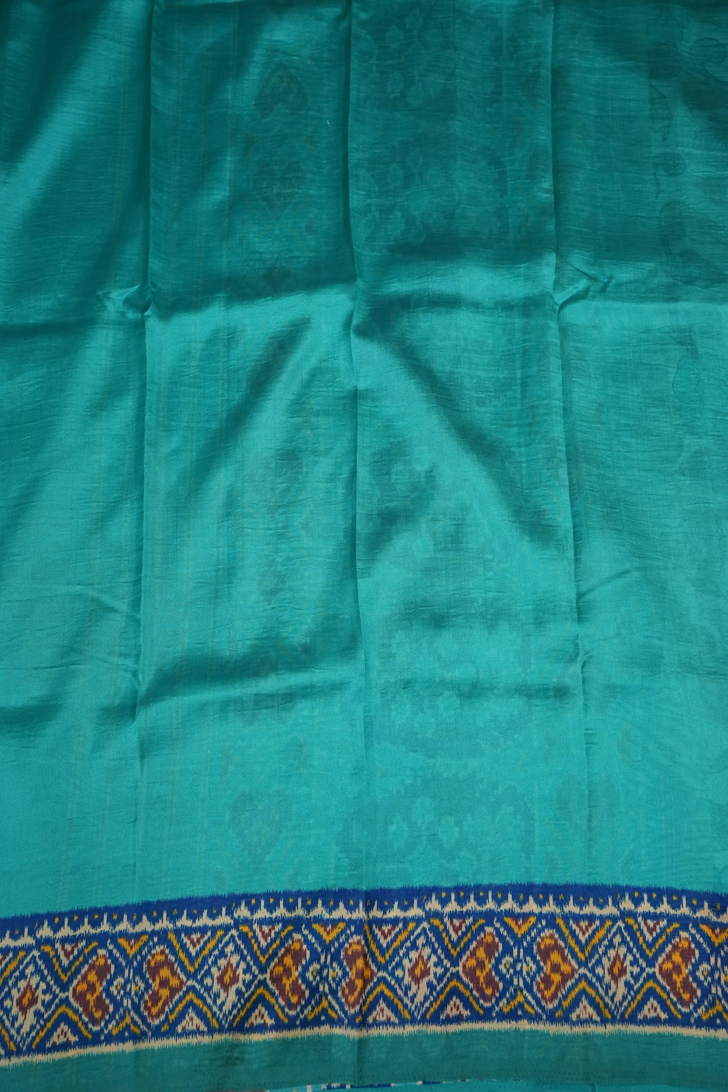 Tussar Saree with Kalamkari Body & Patola-Inspired Border and Pallu – Beige & Turquoise Blue