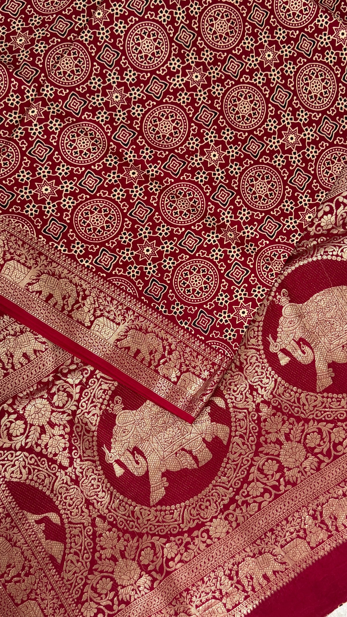Pure Modal Based Saree with Ajrakh Prints & Banarasi Elephant Zari Border – Maroon