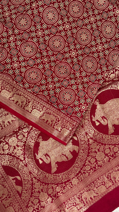 Pure Modal Based Saree with Ajrakh Prints & Banarasi Elephant Zari Border – Maroon