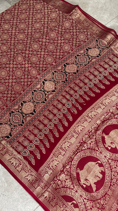 Pure Modal Based Saree with Ajrakh Prints & Banarasi Elephant Zari Border – Maroon