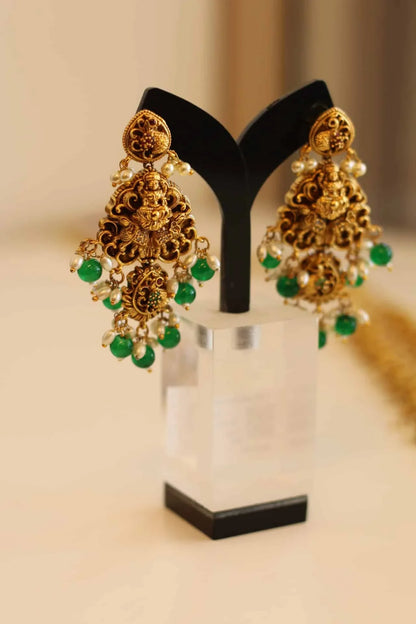 Long Bridal Temple Jewellery with pearl emerald,and ruby color stone details.