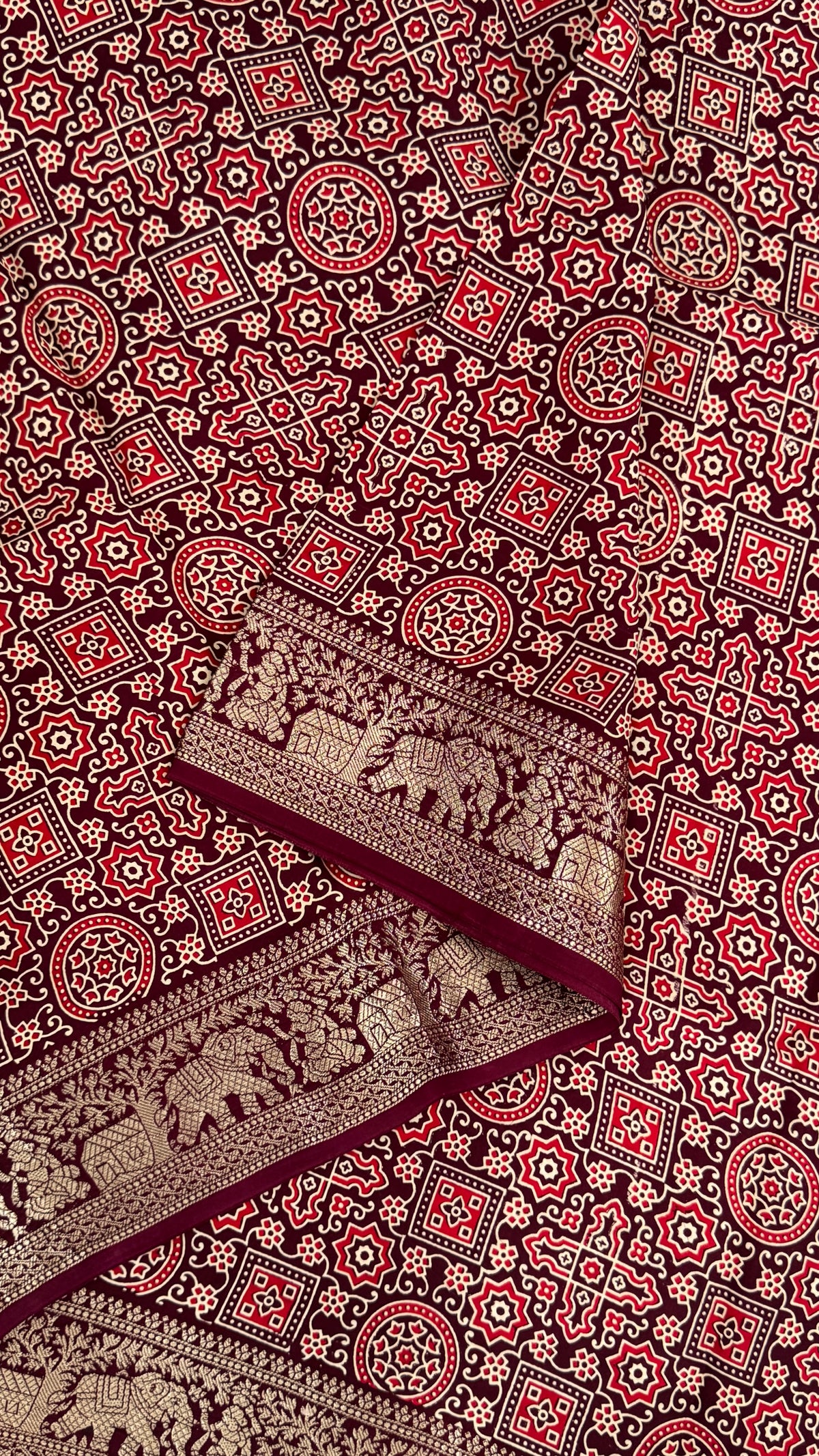 Pure Modal Based Saree with Ajrakh Prints & Banarasi Elephant Zari Border – Deep Maroon