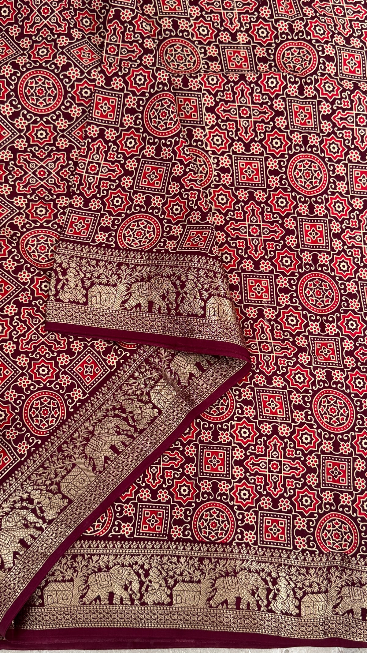 Pure Modal Based Saree with Ajrakh Prints & Banarasi Elephant Zari Border – Deep Maroon