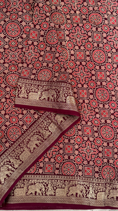 Pure Modal Based Saree with Ajrakh Prints & Banarasi Elephant Zari Border – Deep Maroon