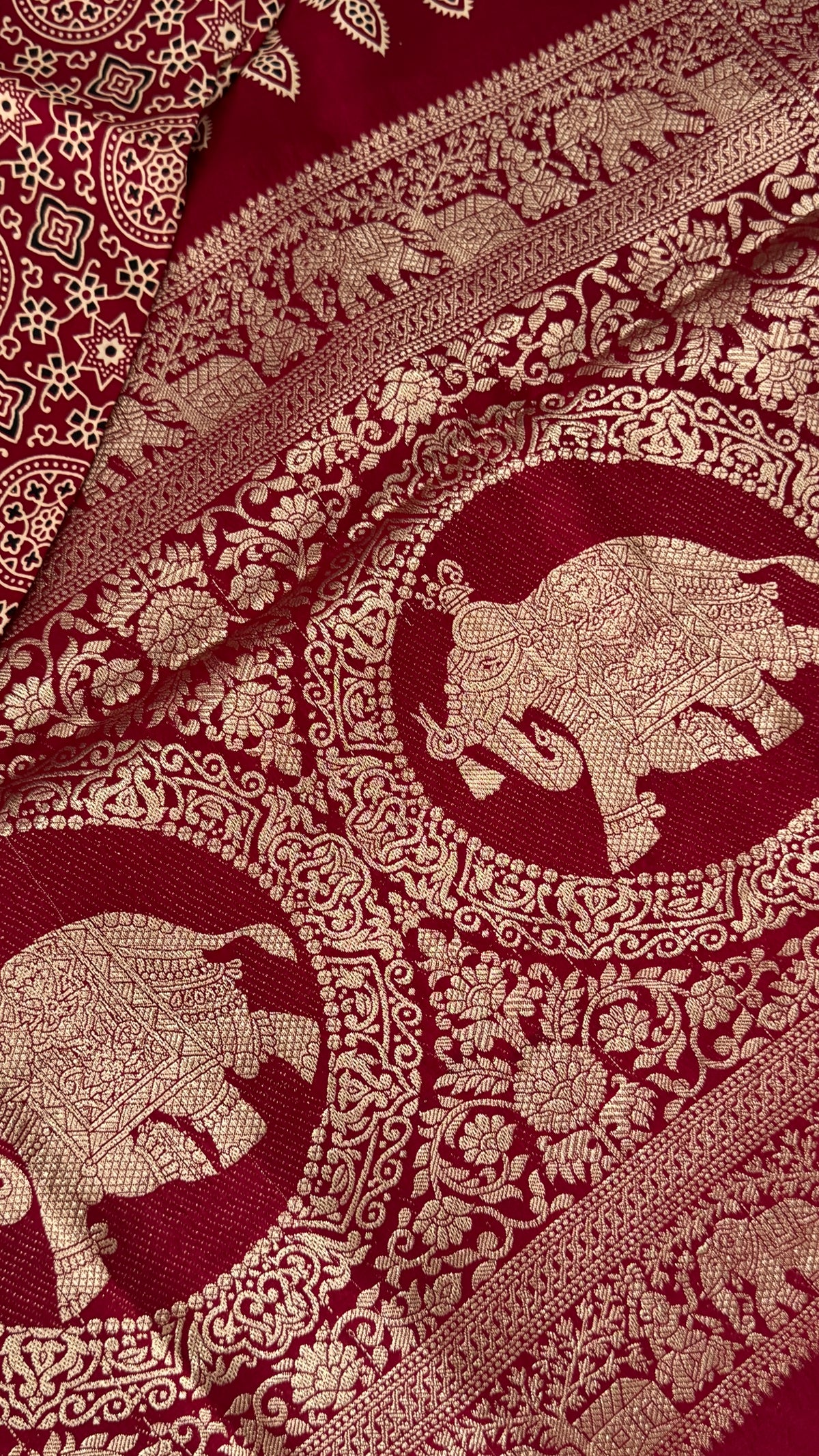 Pure Modal Based Saree with Ajrakh Prints & Banarasi Elephant Zari Border – Maroon
