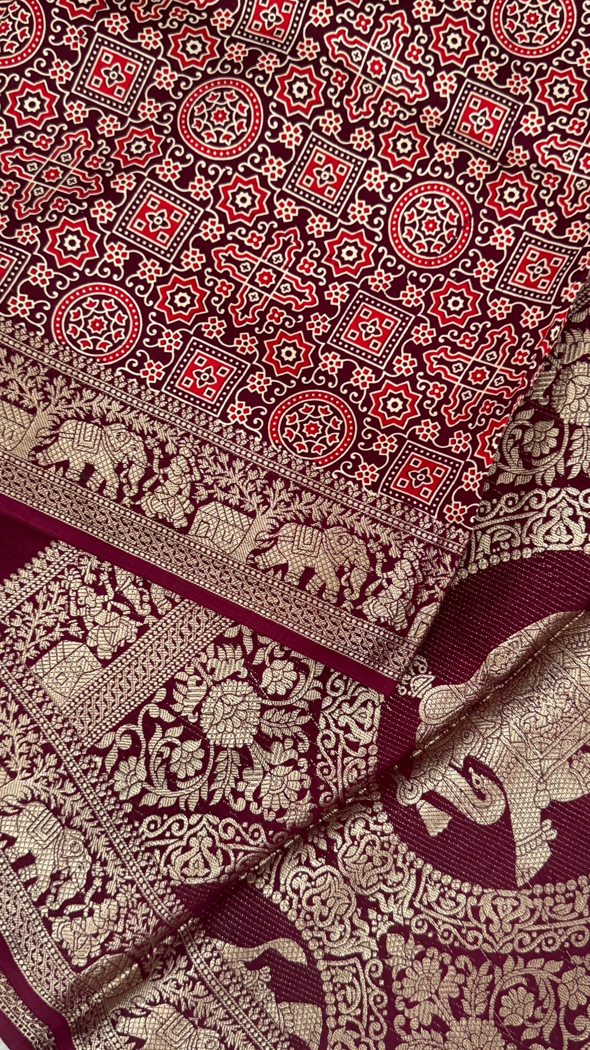 Pure Modal Based Saree with Ajrakh Prints & Banarasi Elephant Zari Border – Deep Maroon