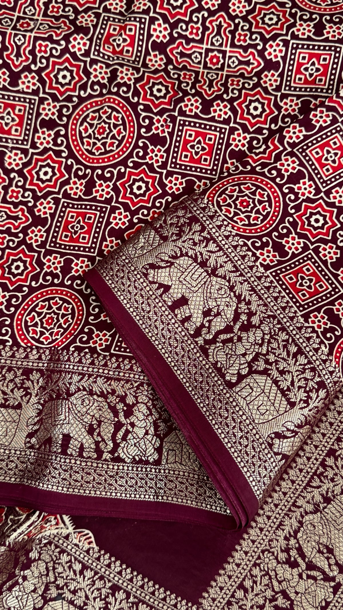 Pure Modal Based Saree with Ajrakh Prints & Banarasi Elephant Zari Border – Deep Maroon