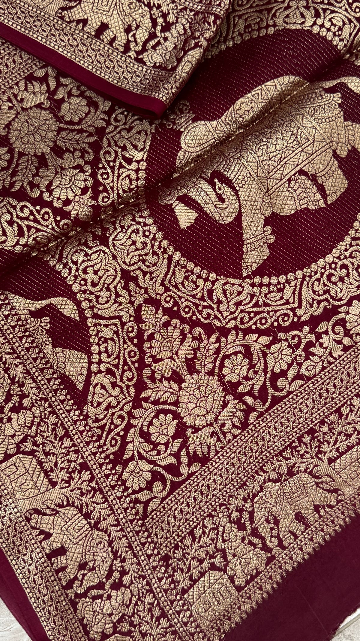 Pure Modal Based Saree with Ajrakh Prints & Banarasi Elephant Zari Border – Deep Maroon