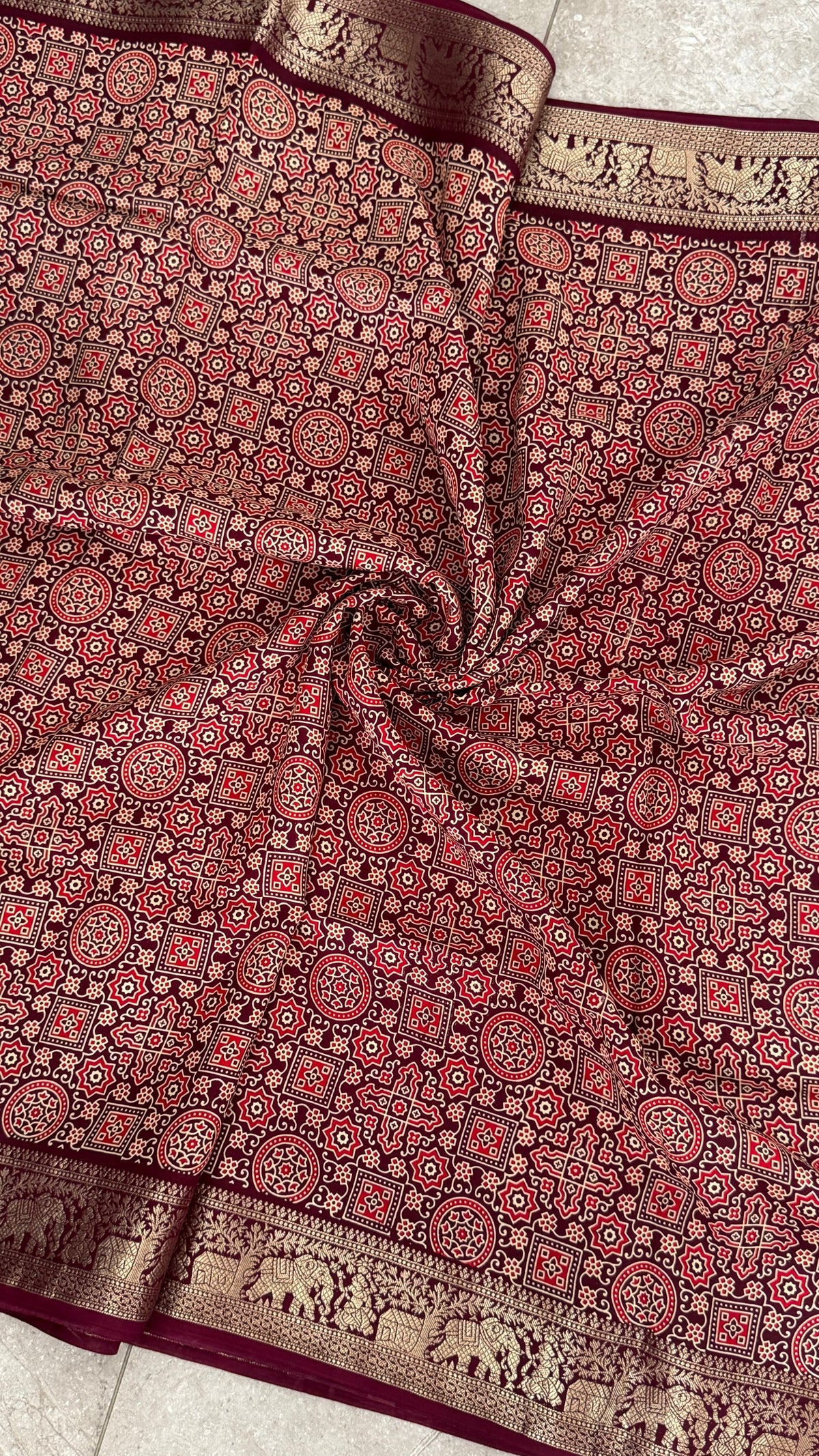 Pure Modal Based Saree with Ajrakh Prints & Banarasi Elephant Zari Border – Deep Maroon