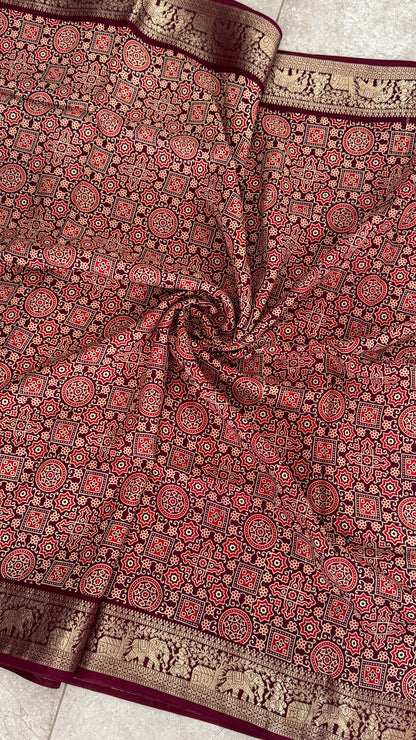 Pure Modal Based Saree with Ajrakh Prints & Banarasi Elephant Zari Border – Deep Maroon