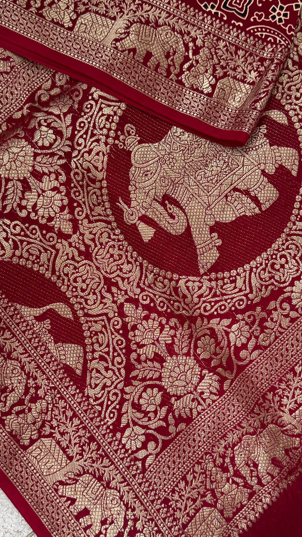 Pure Modal Based Saree with Ajrakh Prints & Banarasi Elephant Zari Border – Maroon