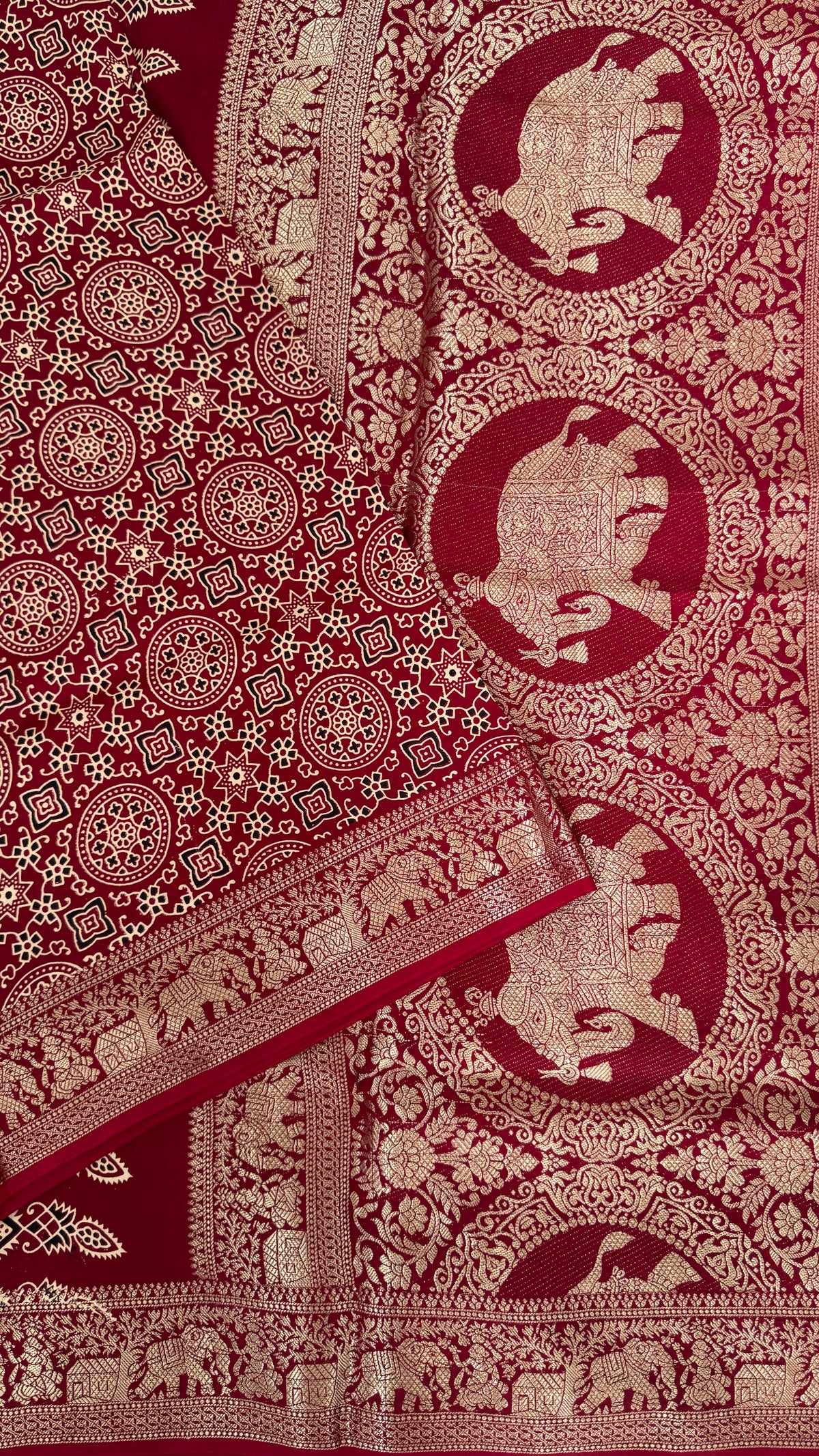 Pure Modal Based Saree with Ajrakh Prints & Banarasi Elephant Zari Border – Maroon