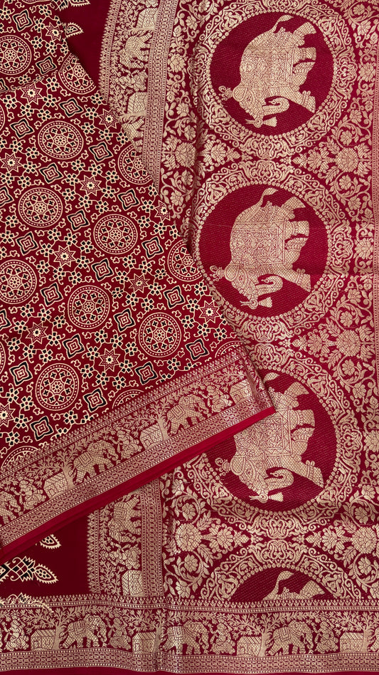 Pure Modal Based Saree with Ajrakh Prints & Banarasi Elephant Zari Border – Maroon