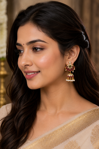 Antique Gold Plated Jhumka with Ruby Stud and Emerald Stone Detailing
