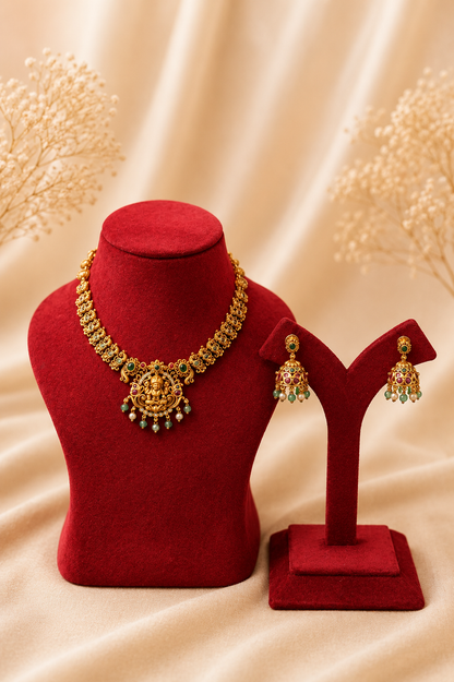 Antique Gold-Plated Lakshmi Pendant Necklace Set with Green Bead Drops