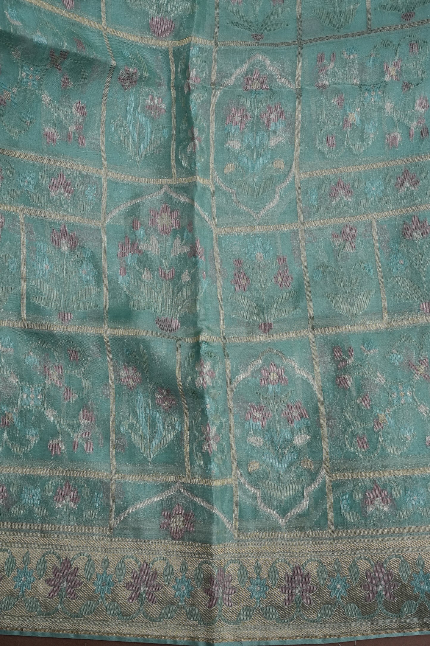Sea Green Woven Floral Tussar Georgette Saree with Zari Border