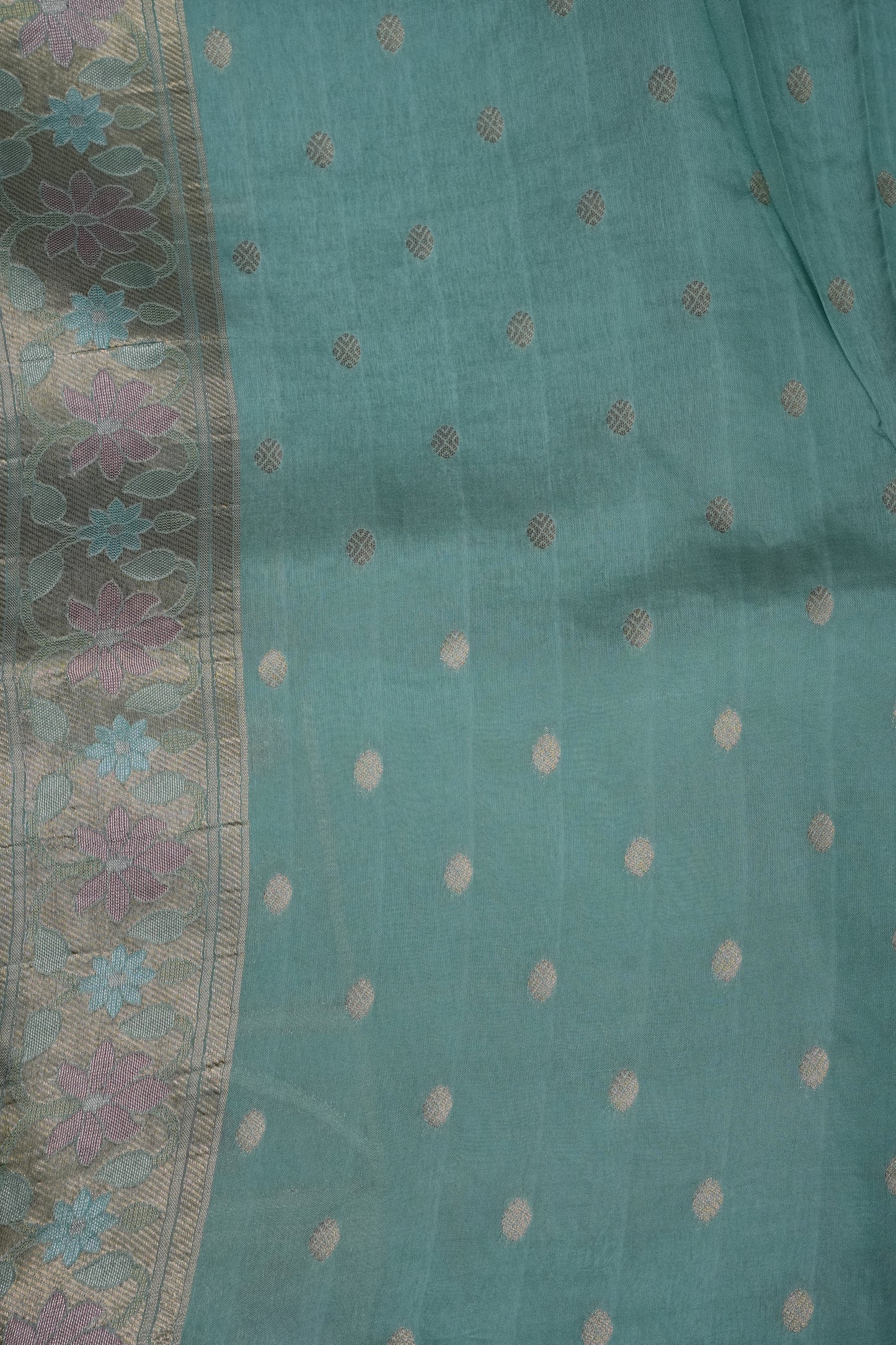 Sea Green Woven Floral Tussar Georgette Saree with Zari Border