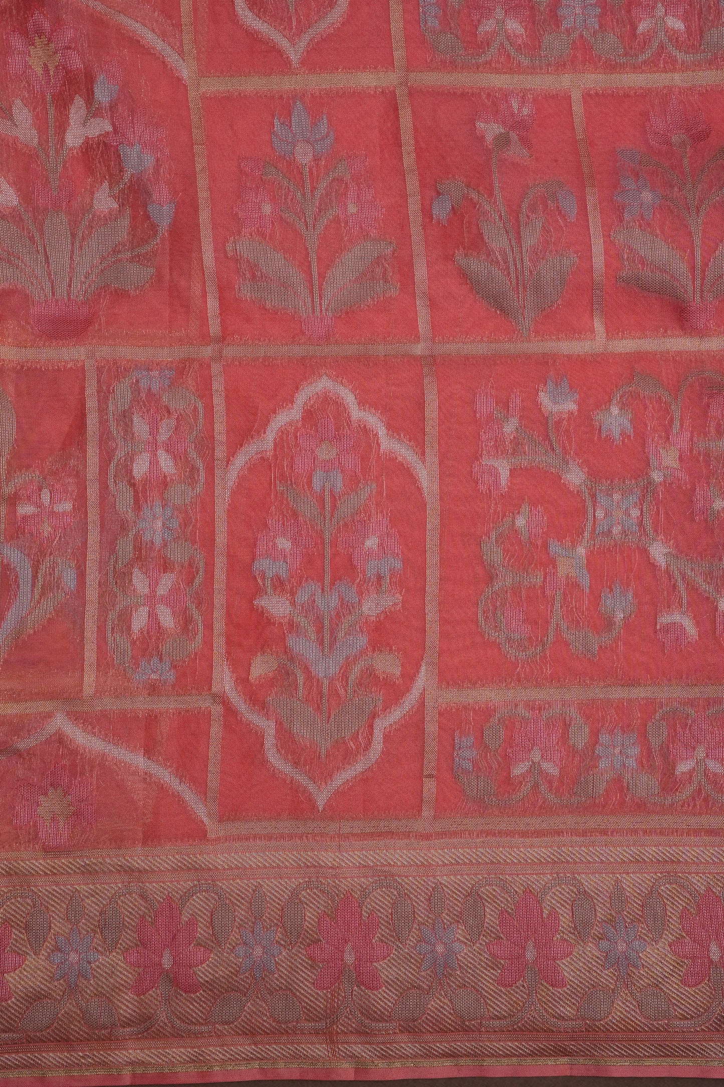 Coral Pink Woven Floral Tussar Georgette Saree with Zari Border