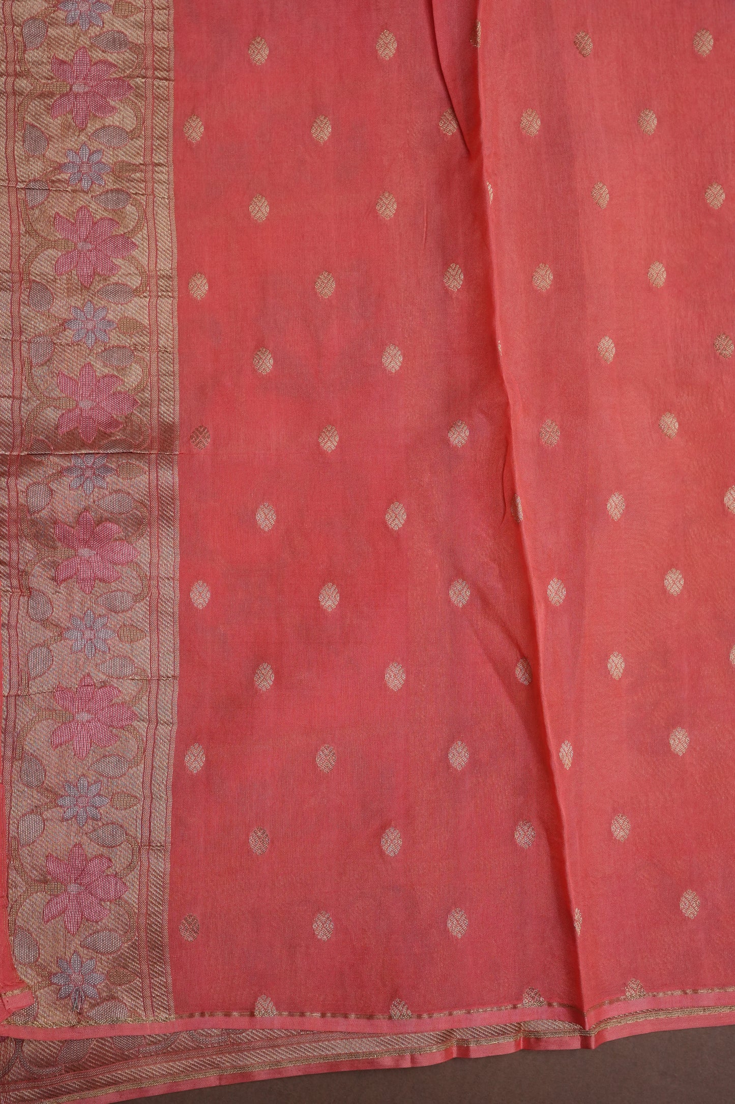 Coral Pink Woven Floral Tussar Georgette Saree with Zari Border