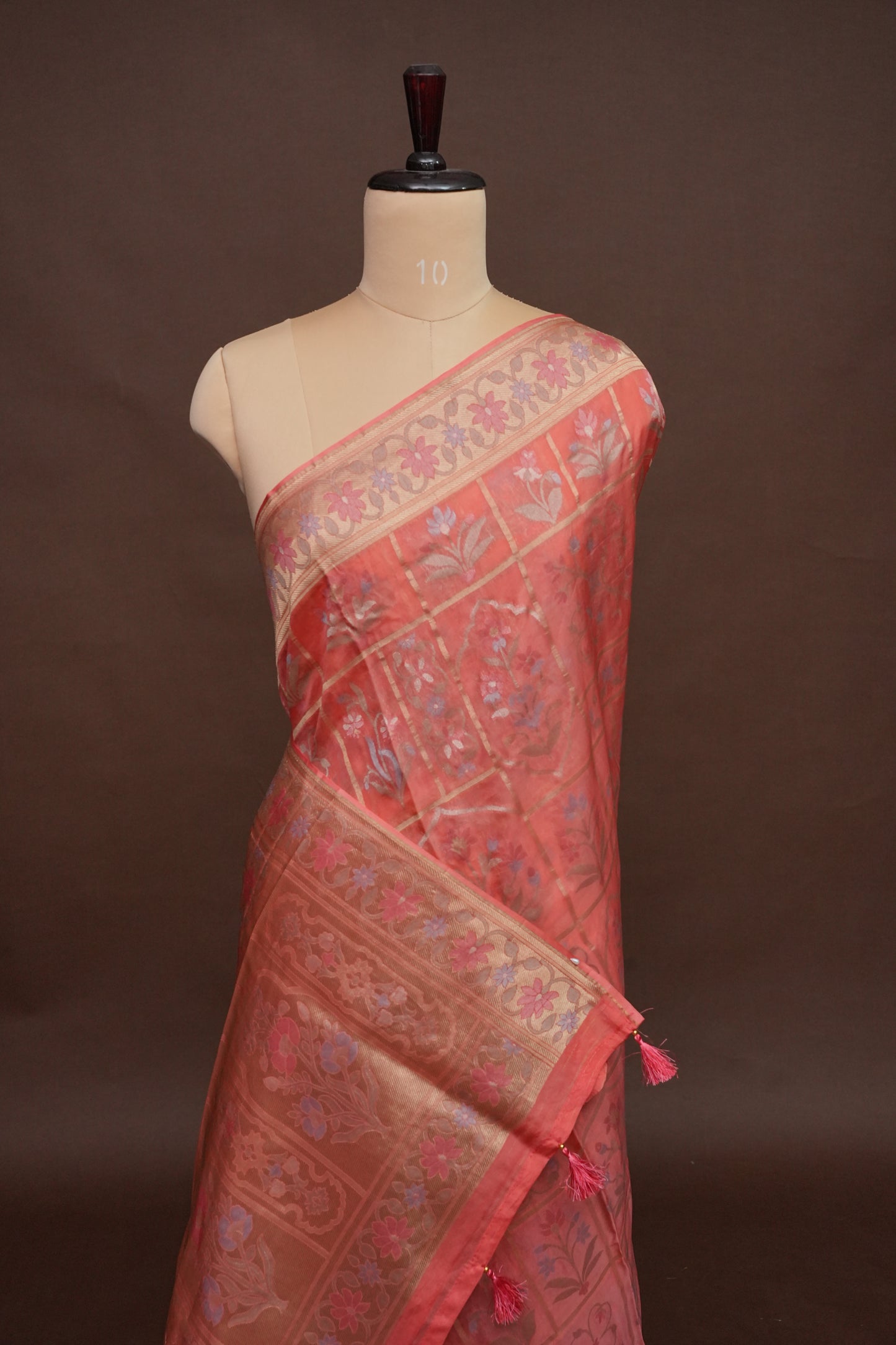 Coral Pink Woven Floral Tussar Georgette Saree with Zari Border