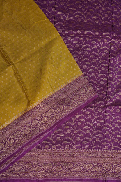 Khaddi Georgette Crepe Silk Saree with Antique Border – Mehendi Yellow & Magenta
