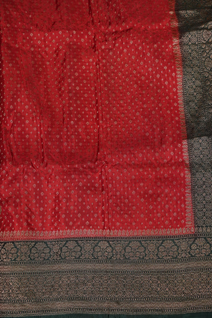 Khaddi Georgette Crepe Silk Saree with Antique Border – Red & Bottle Green