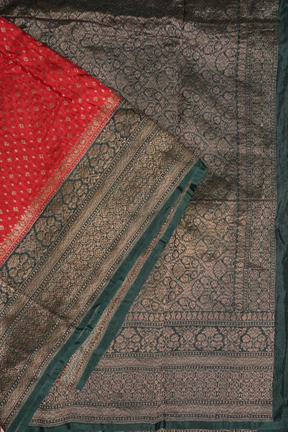 Khaddi Georgette Crepe Silk Saree with Antique Border – Red & Bottle Green