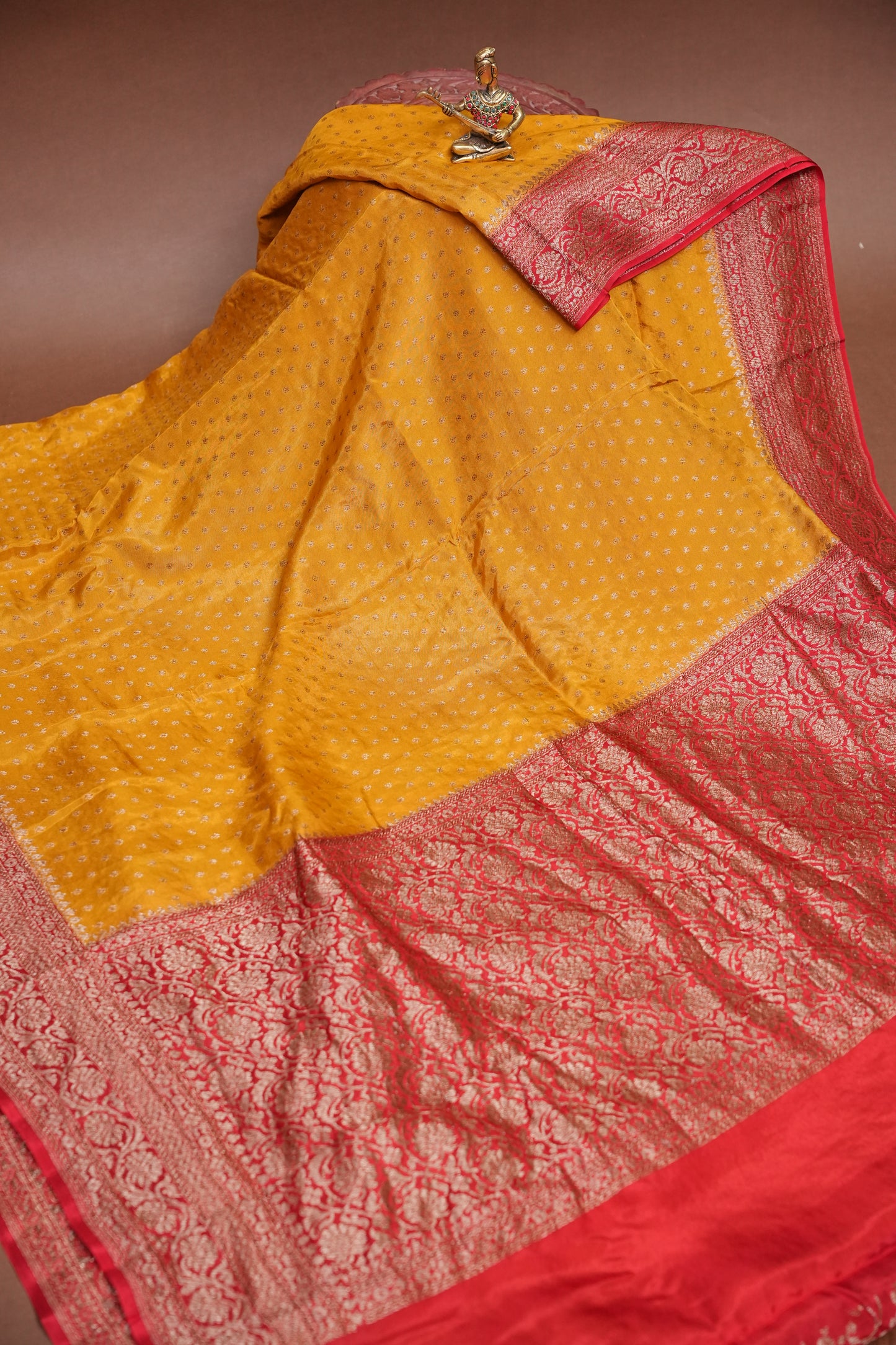 Khaddi Georgette Crepe Silk Saree with Antique Border – Yellow & Red