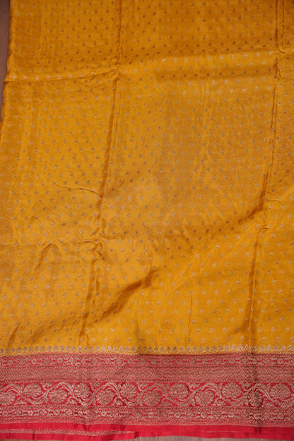 Khaddi Georgette Crepe Silk Saree with Antique Border – Yellow & Red