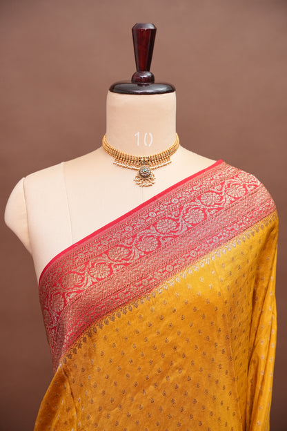 Khaddi Georgette Crepe Silk Saree with Antique Border – Yellow & Red