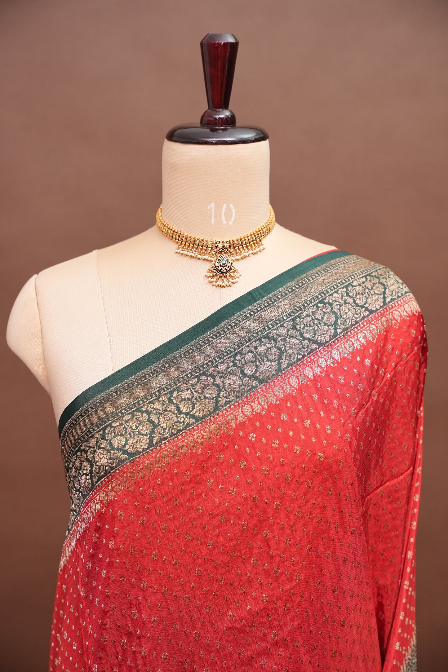 Khaddi Georgette Crepe Silk Saree with Antique Border – Red & Bottle Green