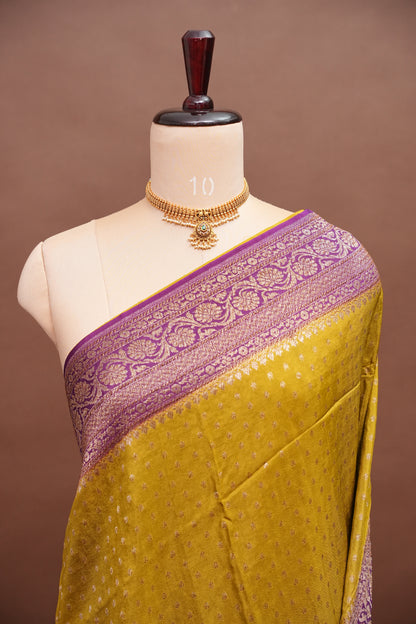 Khaddi Georgette Crepe Silk Saree with Antique Border – Mehendi Yellow & Magenta