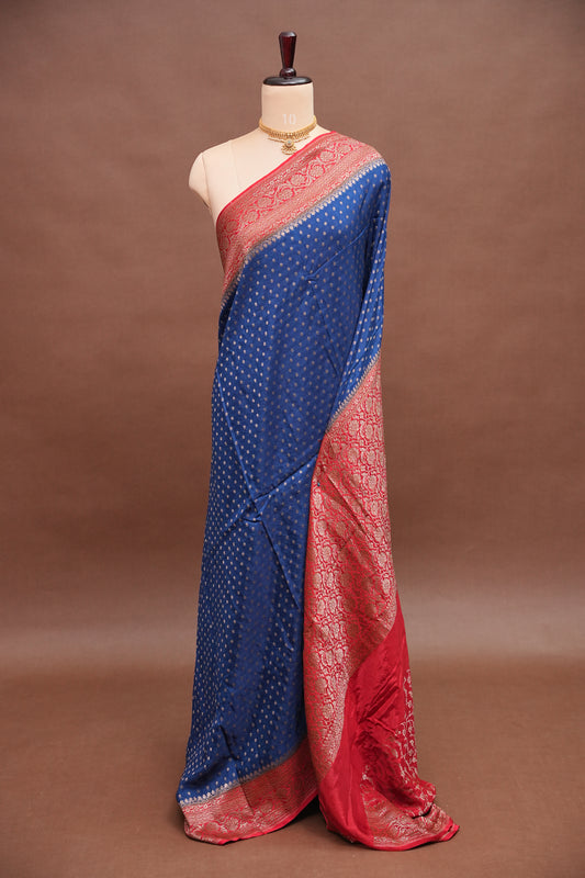 Khaddi Georgette Crepe Silk Saree with Antique Border – Peacock Blue & Red