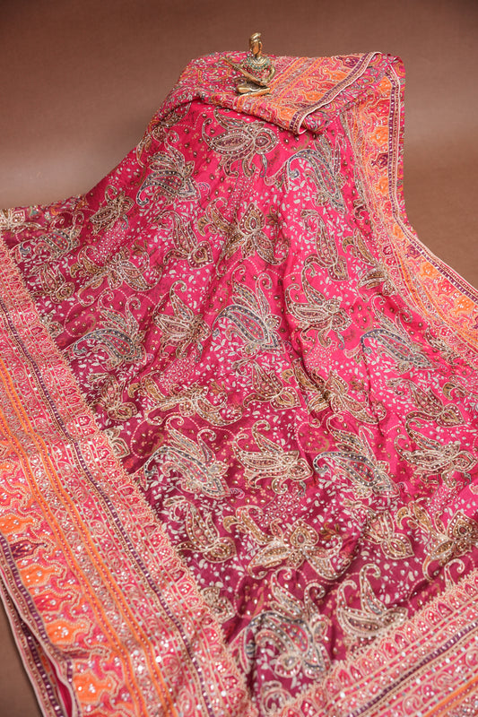 Rani Pink Designer Party Wear Saree with Intricate Paisley Embellishments