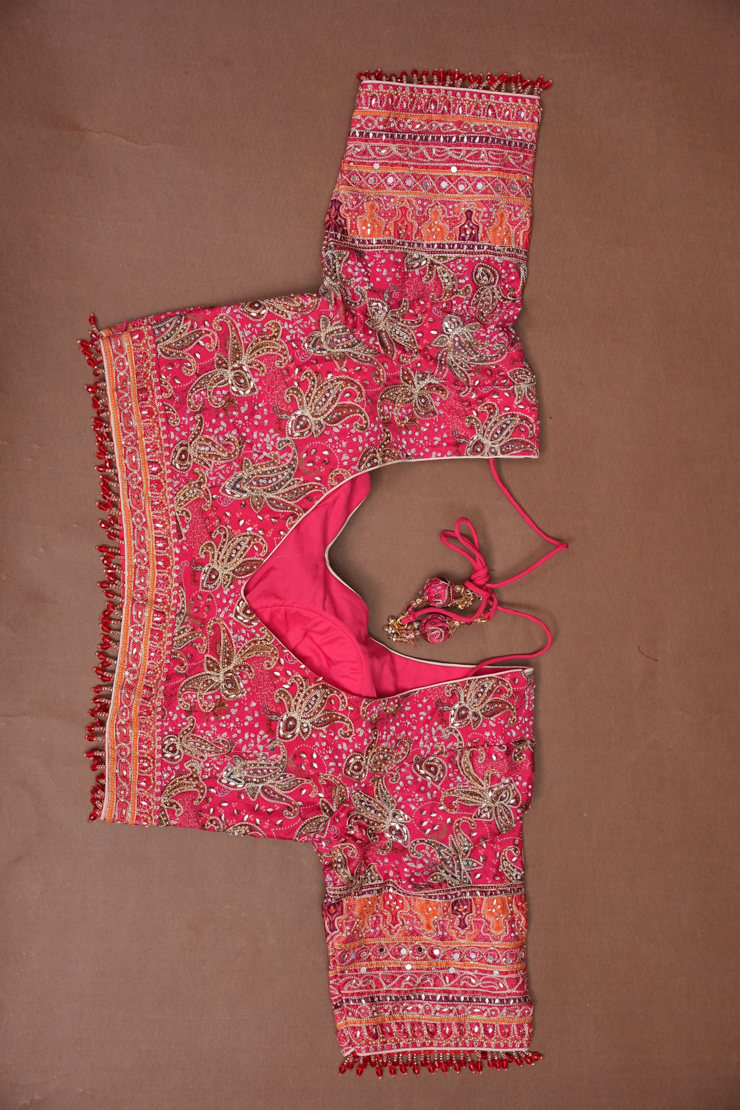 Rani Pink Designer Party Wear Saree with Intricate Paisley Embellishments