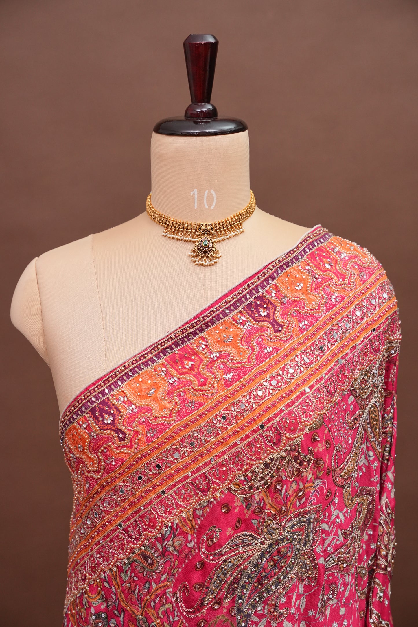 Rani Pink Designer Party Wear Saree with Intricate Paisley Embellishments