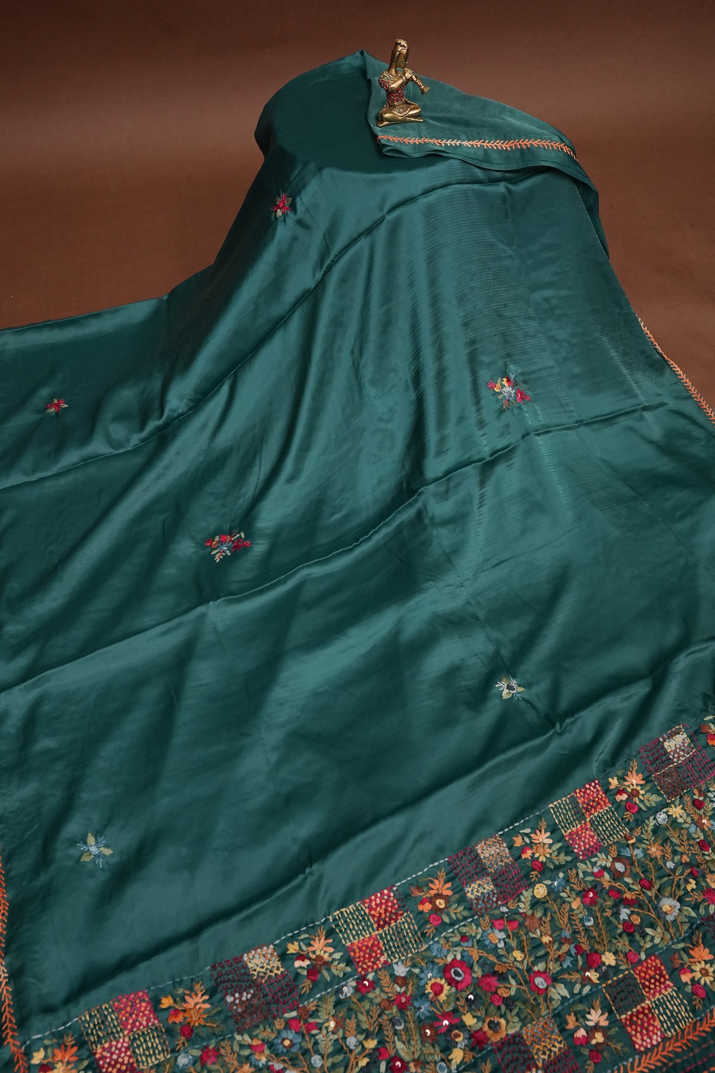 Deep Teal Green Crepe silk saree with French knot work