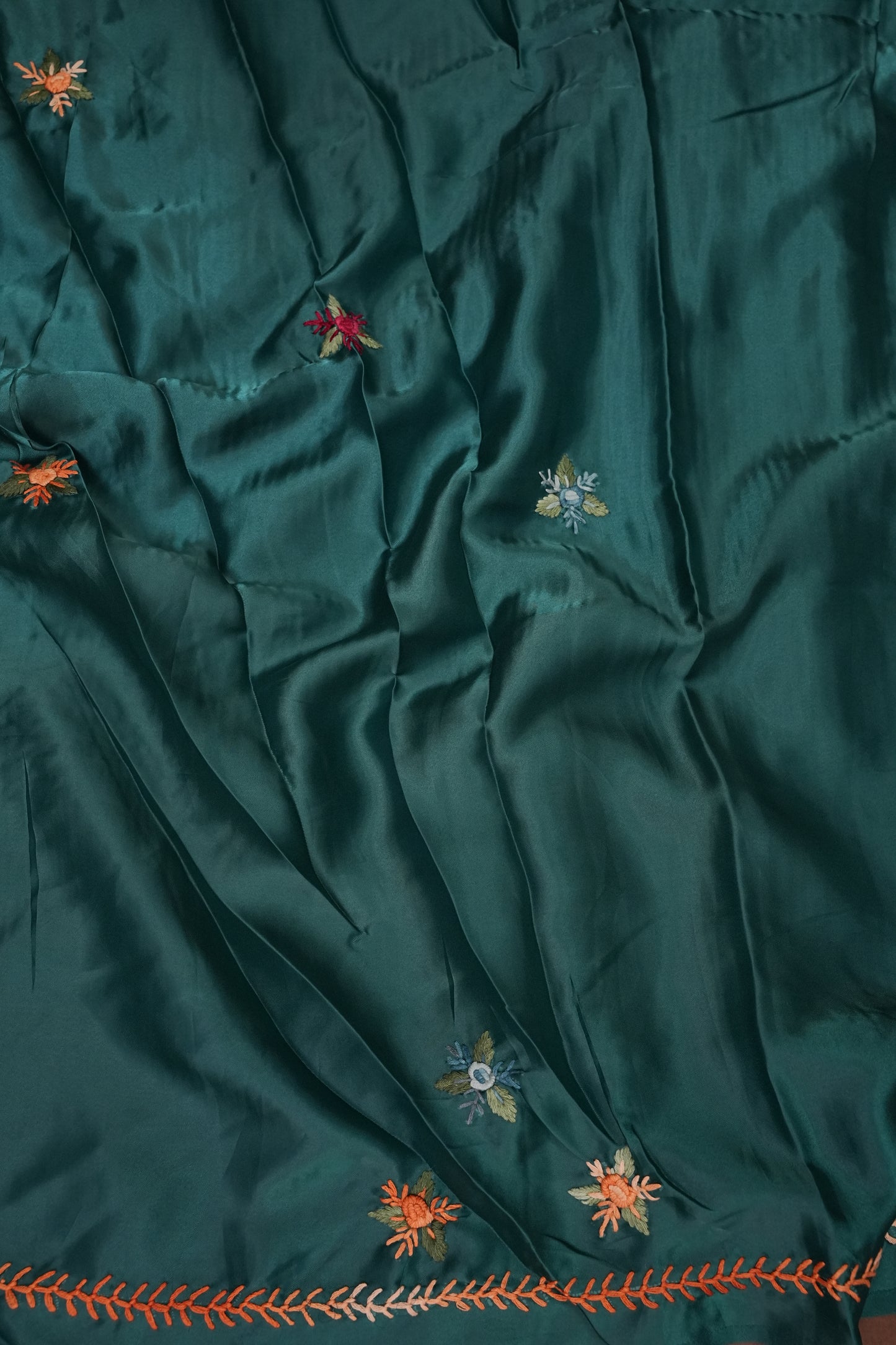 Deep Teal Green Crepe silk saree with French knot work