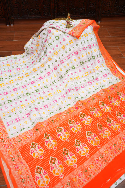Heavy Georgette Banarasi Saree with Geometric Jaal Weaving – White & Bright Orange
