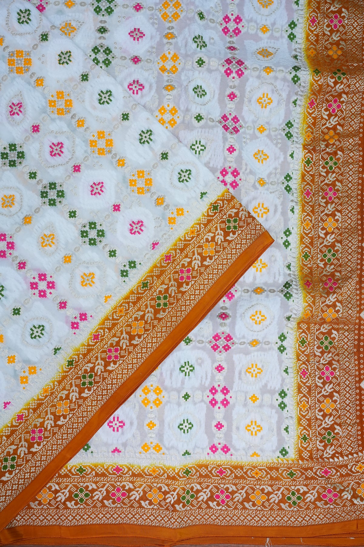 Heavy Georgette Banarasi Saree with Geometric Jaal Weaving – White & Mustard