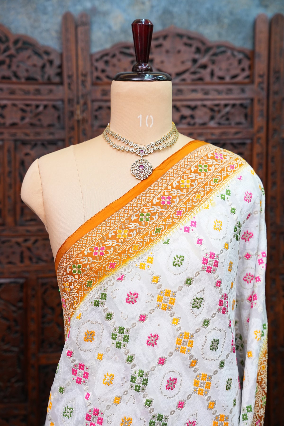 Heavy Georgette Banarasi Saree with Geometric Jaal Weaving – White & Mustard