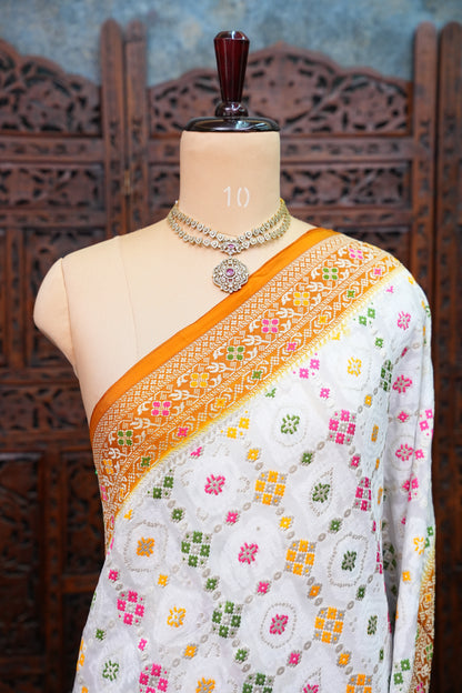Heavy Georgette Banarasi Saree with Geometric Jaal Weaving – White & Mustard