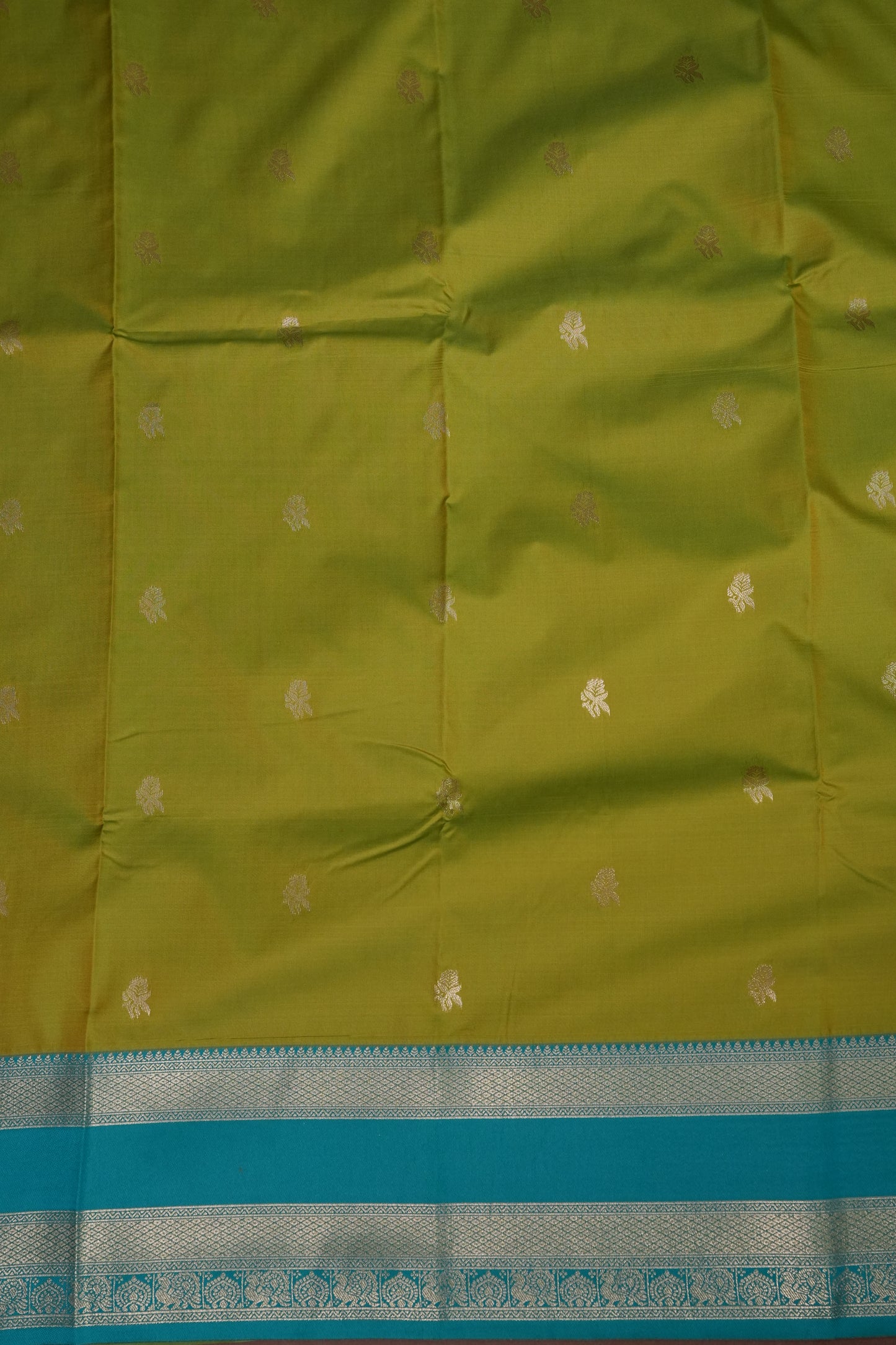 Lime Green Semi Silk Saree with Aqua Blue Silver Zari Border