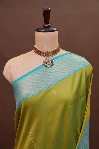 Lime Green Semi Silk Saree with Aqua Blue Silver Zari Border