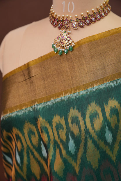 Pure Ikkat Silk Cotton Saree - Bottle Green & Mustard