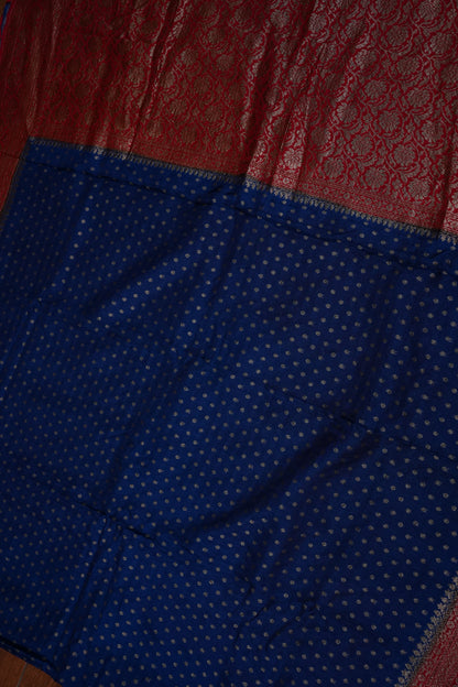 Khaddi Georgette Crepe Silk Saree with Antique Border – Peacock Blue & Red