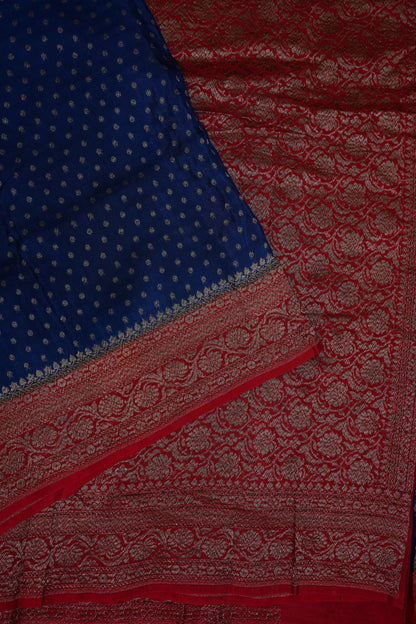 Khaddi Georgette Crepe Silk Saree with Antique Border – Peacock Blue & Red