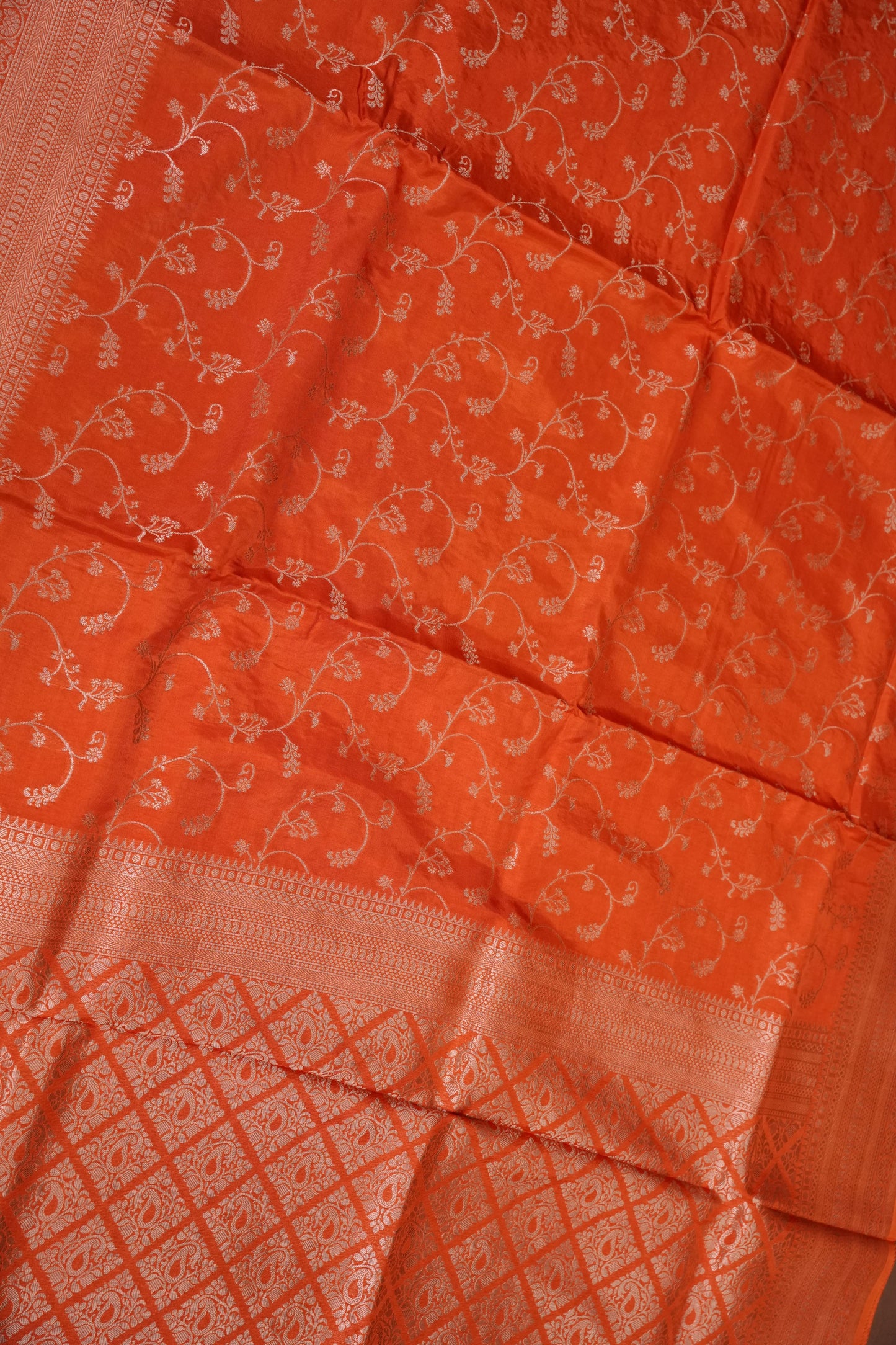 Banarasi Silk Saree – Vibrant Coral Orange with Antique Gold Zari Floral Weave