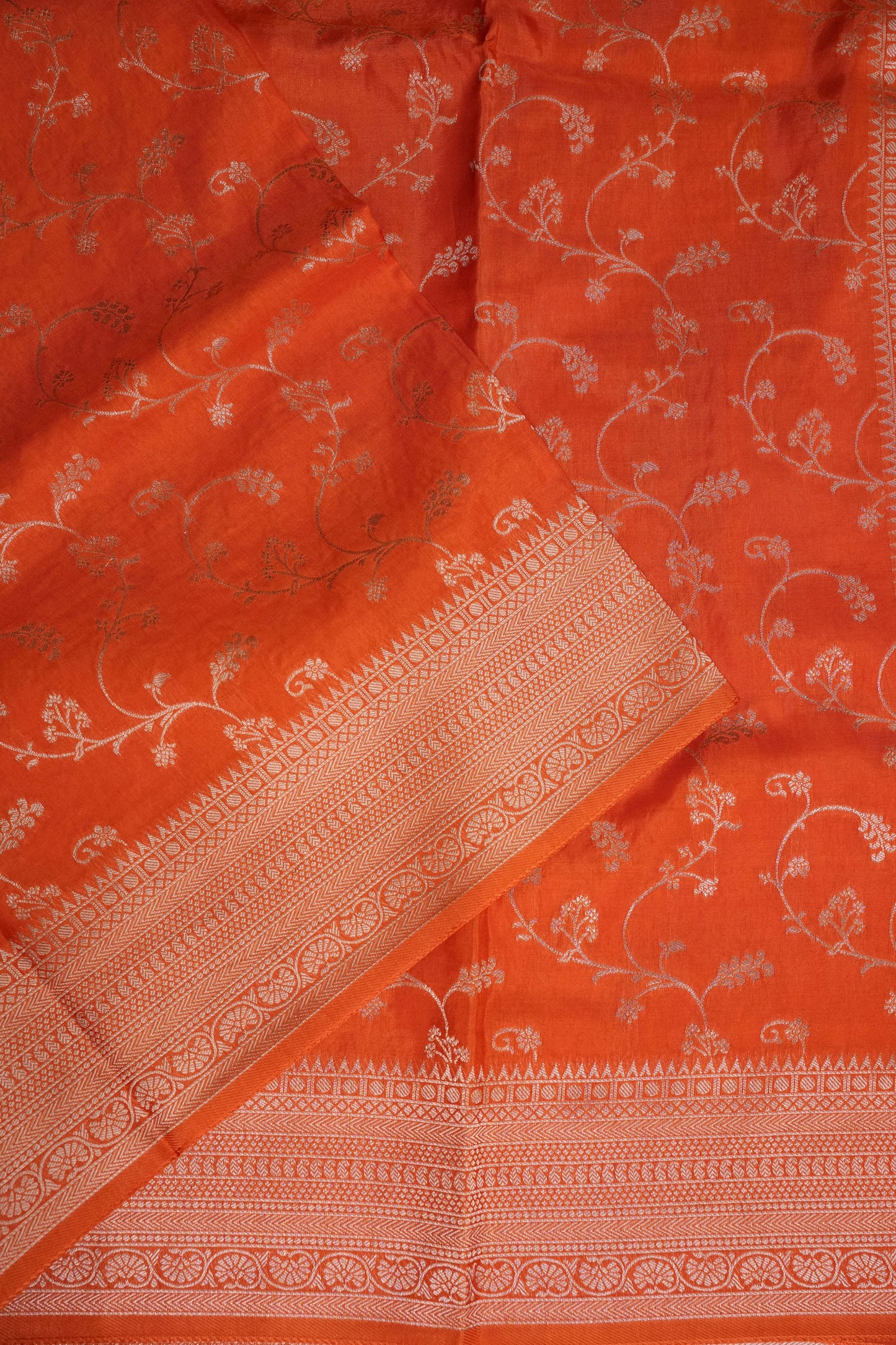 Banarasi Silk Saree – Vibrant Coral Orange with Antique Gold Zari Floral Weave